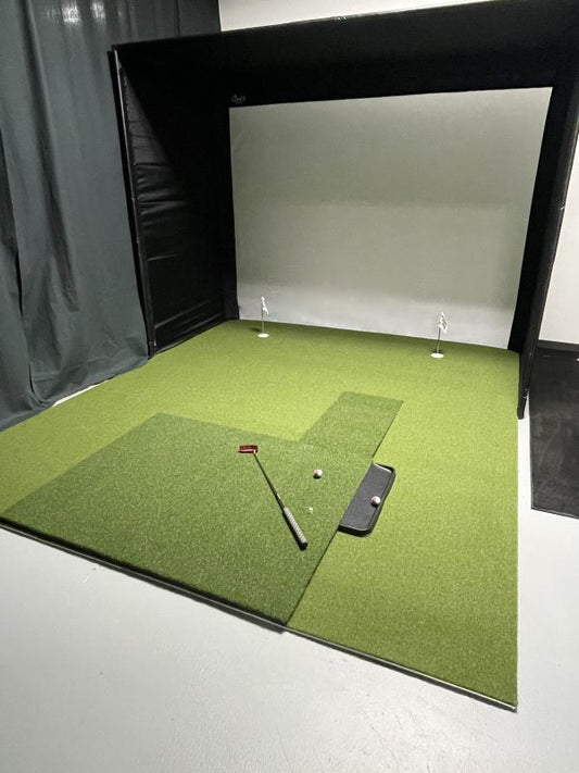 "Angled view of the Big Moss Commander GST Custom Putting Studio - Fits SIG Pro, Sim-in-a Box showing turf surface - ALLBGT"