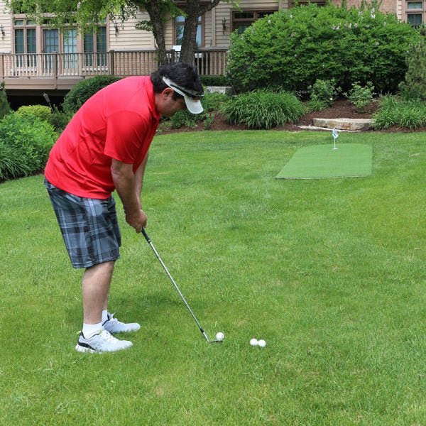 Golfer practicing short putts on Big Moss Commander Patio Series Putting Green 4x15 - 1 cup - ALLBGT