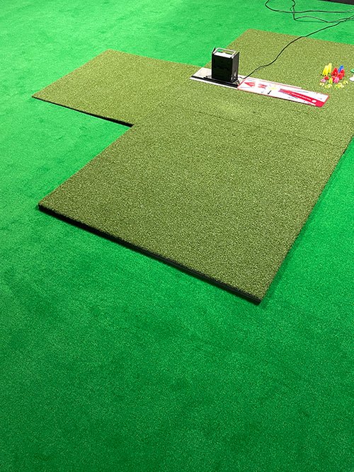 "Golfer practicing putts with the Big Moss TL Ball Return Ramp 3x3 Putting Green Accessory for golf ball return - ALLBGT"