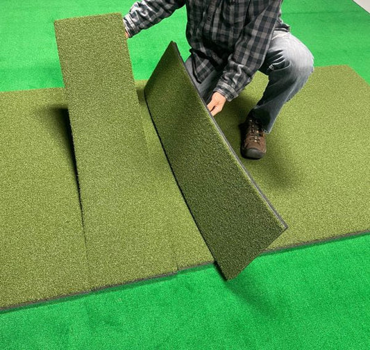 Golfer assembling Big Moss True Launch PLUS R/L ready SIM Kit 5'x 9' with interlocking turf panels - ALLBGT
