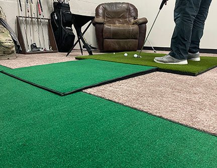 "Angled view of the Big Moss V2 Golf Putting Simulator with Ball Return Ramp set up in home golf training space - ALLBGT"