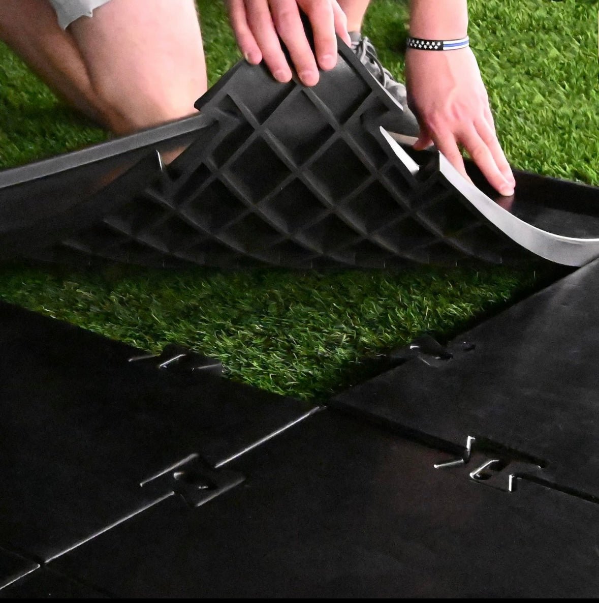 "Underside view of Carl’s Place HotShot Golf Mat System showing interlocking base and turf padding - ALLBGT."