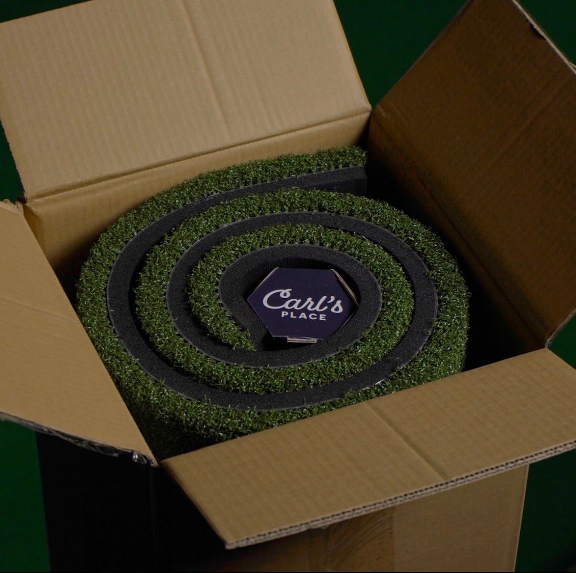 "Carl’s Place HotShot Golf Mat System rolled and packaged for delivery - ALLBGT."