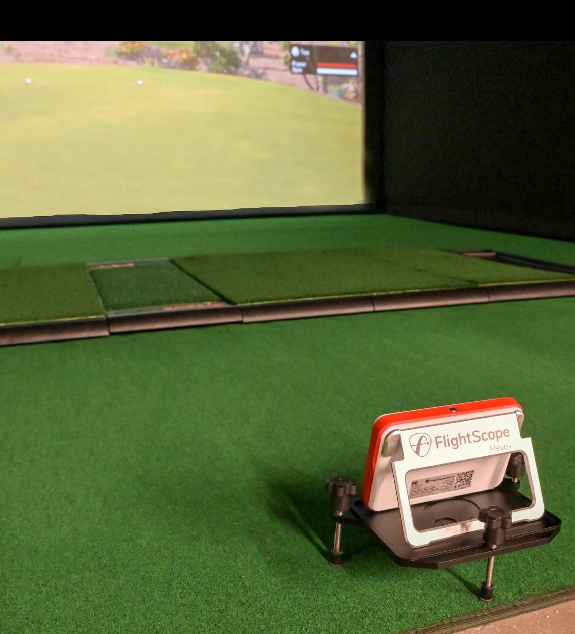 Indoor golf simulator setup featuring Carl’s Place Golf Launch Monitor Alignment Stand - ALLBGT