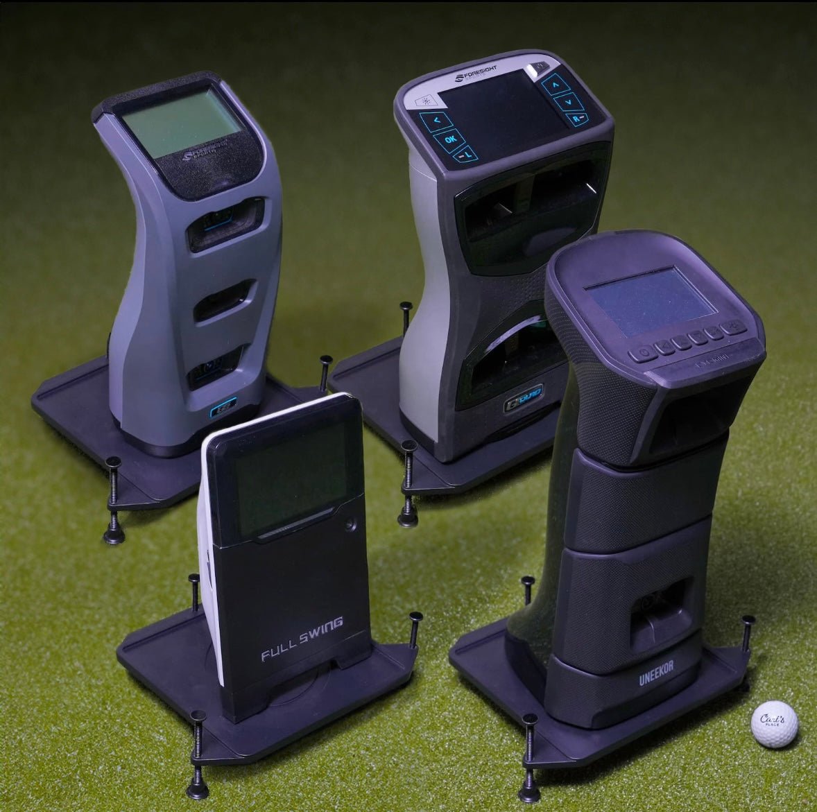 Multiple golf launch monitors displayed on Carl’s Place Golf Launch Monitor Alignment Stands for simulator setup - ALLBGT