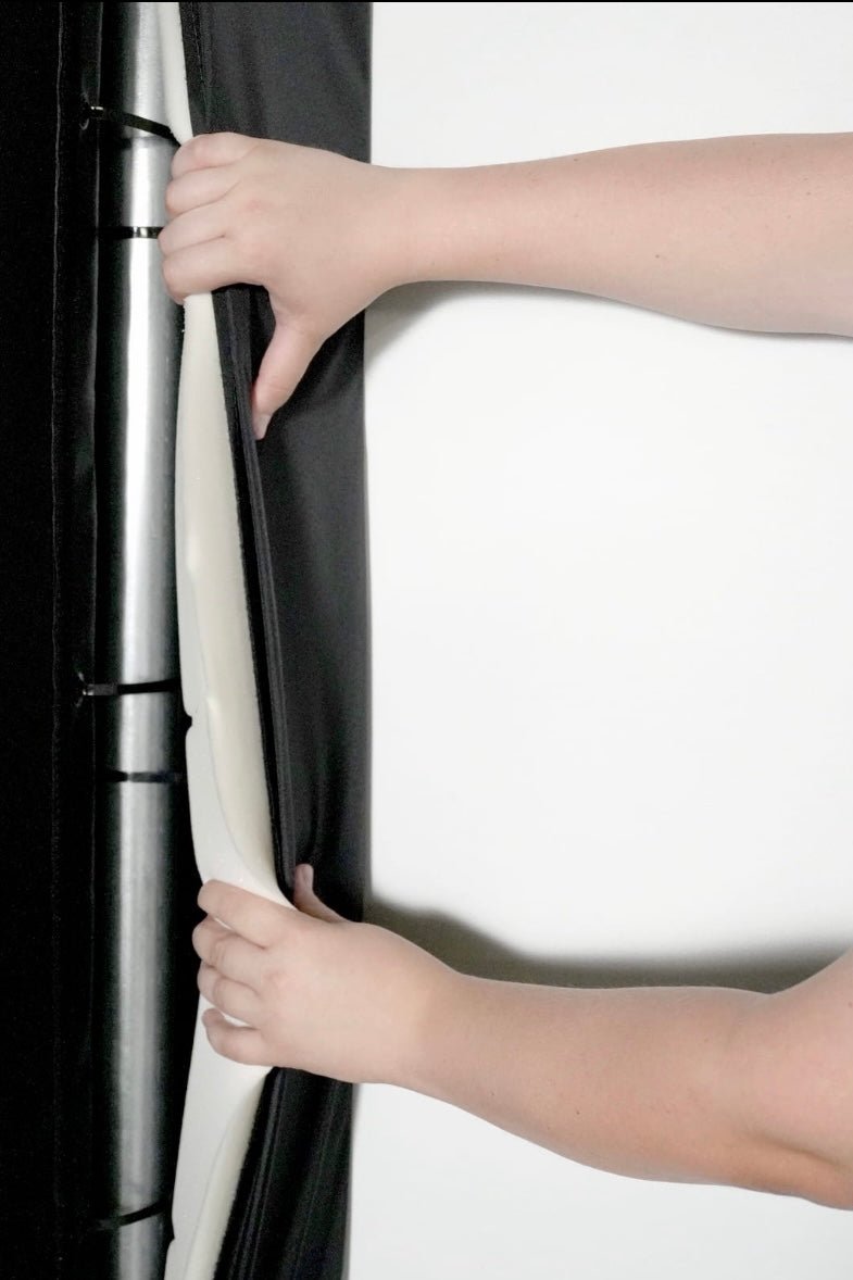 "Close-up of Carl’s Place Pro Golf Simulator Enclosure showing durable black frame and impact screen fabric - ALLBGT."