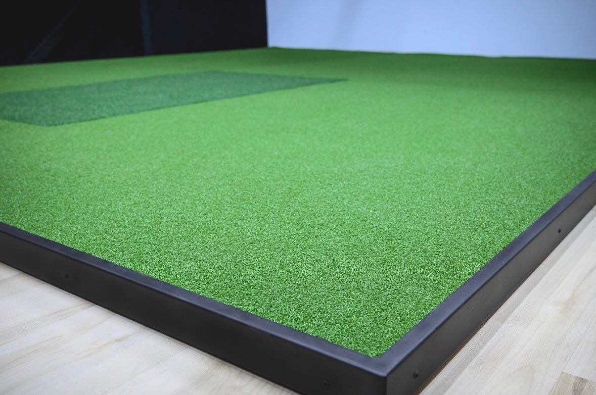 Carl's Place Golf Simulator flooring platform with green turf hitting surface for realistic indoor golf experience - ALLBGT