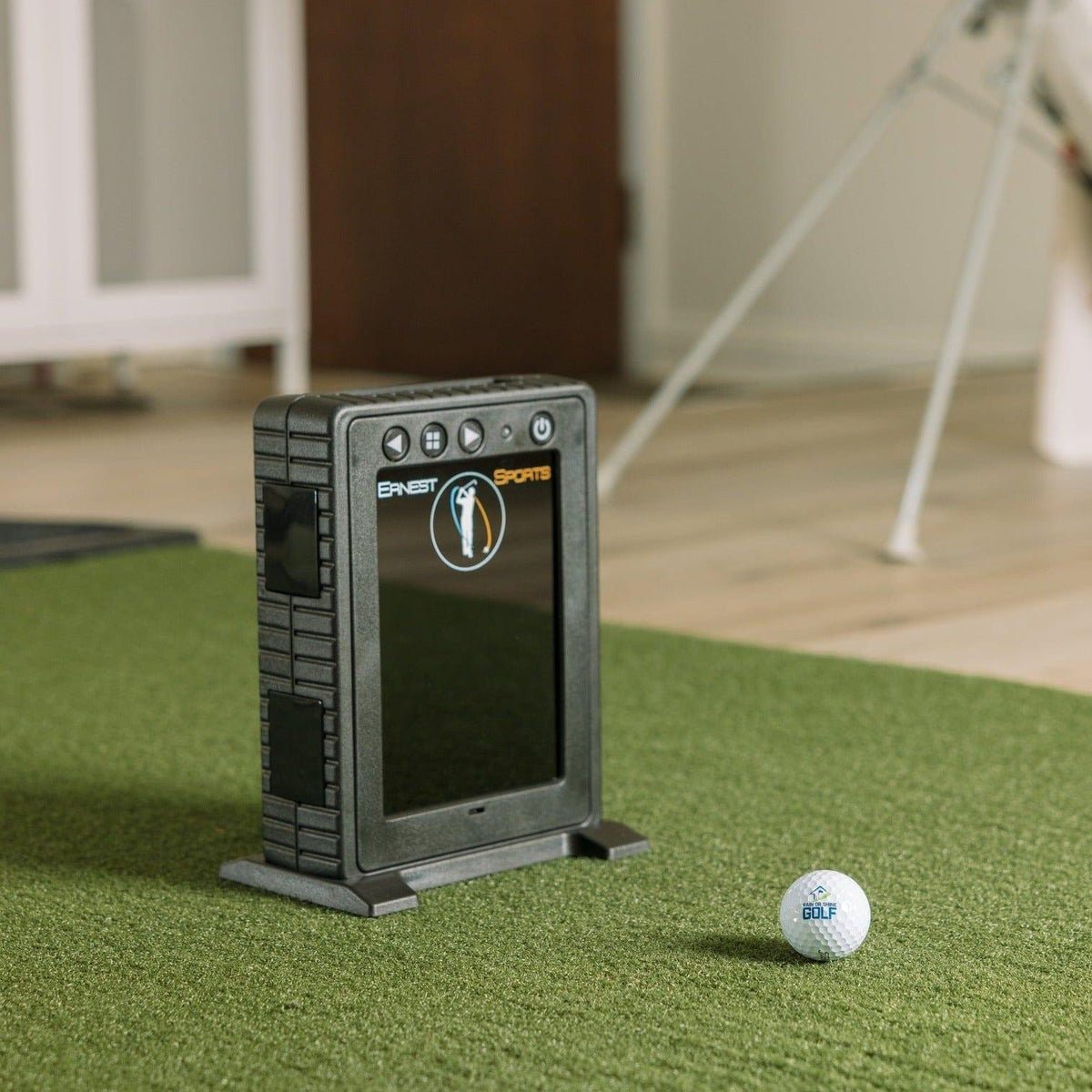 Ernest Sports ES Tour Plus Launch Monitor 2.0 Placed behind golf ball on practice mat for setup view - ALLBGT