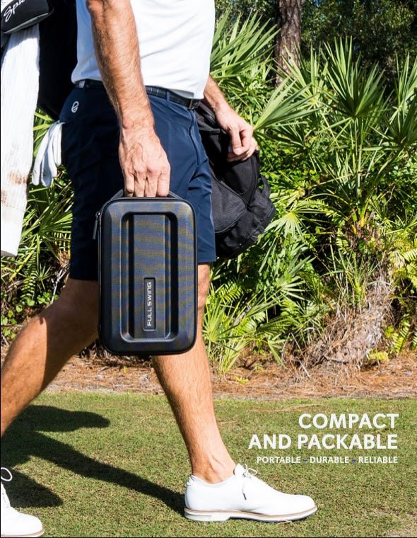 Full Swing KIT Golf Launch Monitor carrying case being carried by a person walking with it in hand - ALLBGT