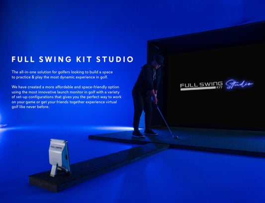 “Golfer practicing indoors using the Full Swing Kit Studio with launch monitor and blue studio lighting - ALLBGT.”