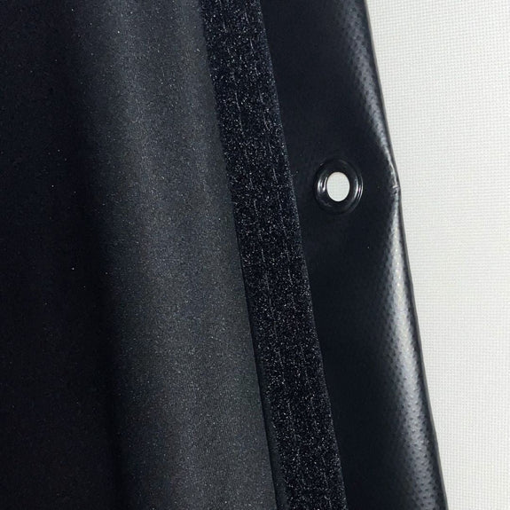 Golf Simulator Blackout Screen opaque golf simulator screen fabric with reinforced edge and velcro backing for light control.
