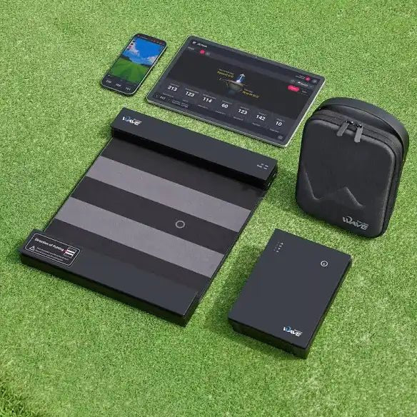 Golfzon Wave Launch Monitor complete package shown laid on green grass - ALLBGT