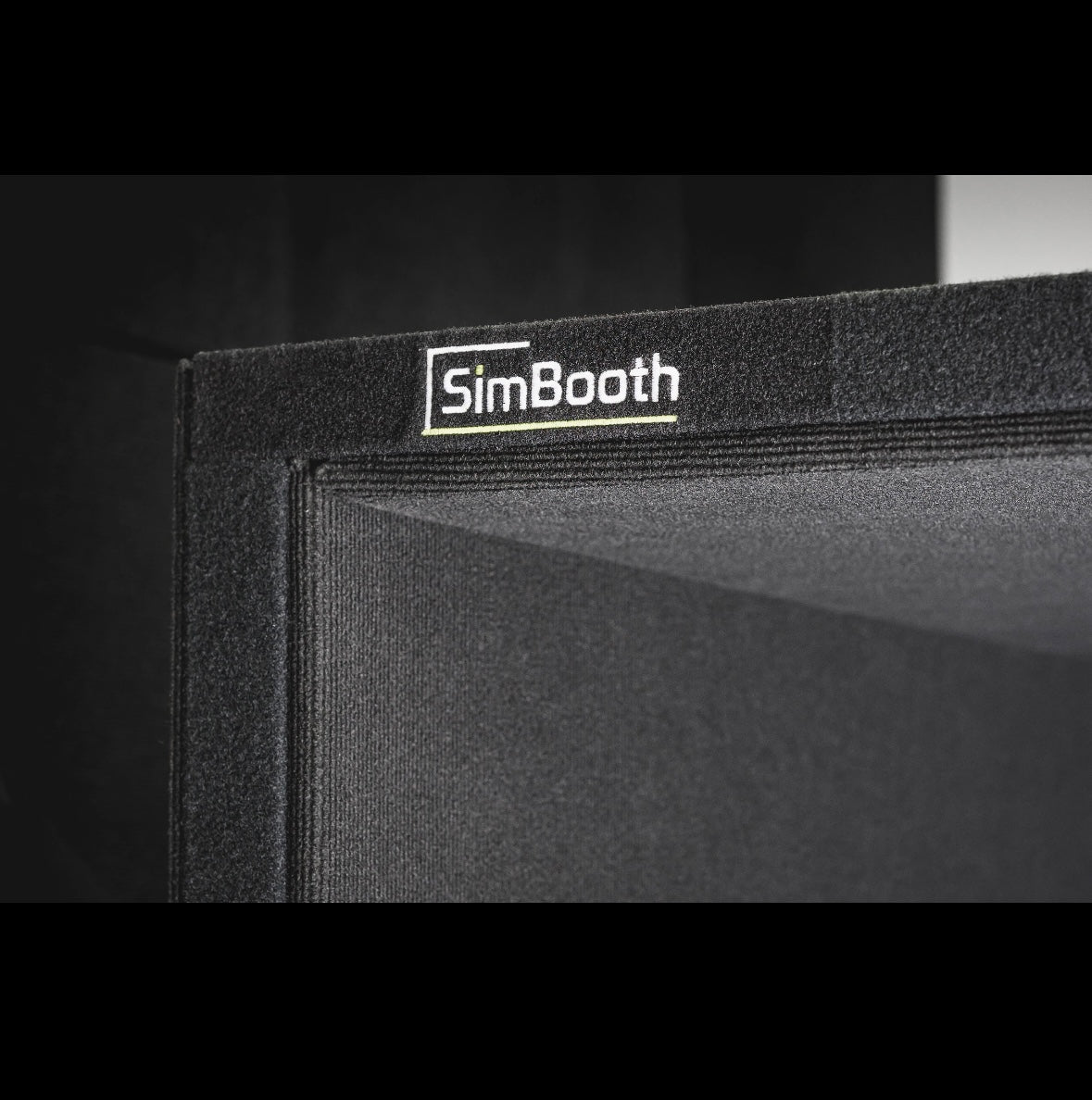 “Close-up of SimBooth 1 Enclosure frame showing premium black finish and SimBooth branding - ALLBGT”
