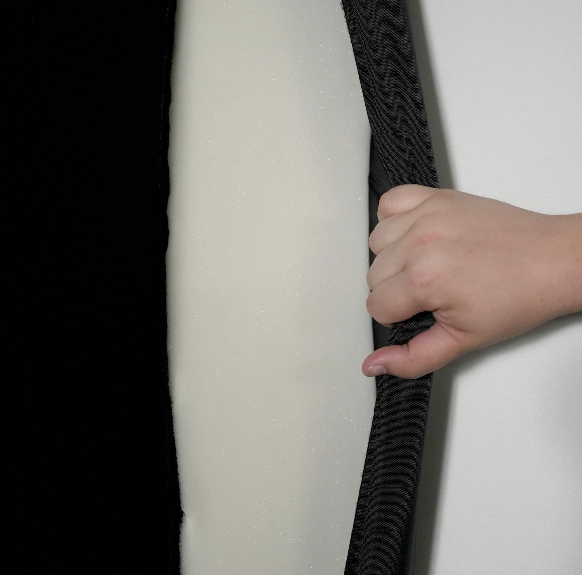 "Detailed view of Carl’s Place golf simulator enclosure kit impact screen attachment and tension system - ALLBGT."