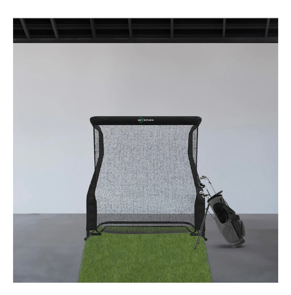 Front view of The Net Return Mini Package Golf net setup indoors with golf bag - ALLBGT
