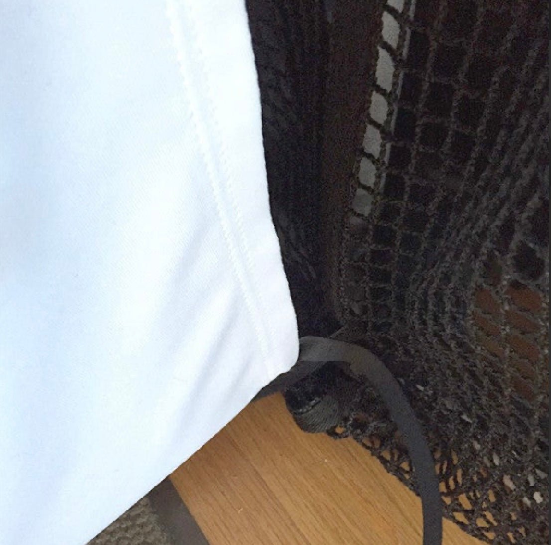 Close-up of The Net Return Simulator Bay 8 Projection Screen fabric and frame edge showing high-quality detail - ALLBGT