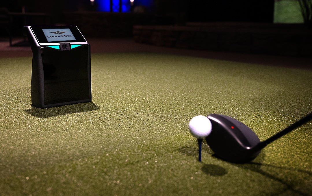 "Golfer mid-swing with the TruGolf LaunchBox Launch Monitor tracking shot data and performance metrics - ALLBGT"