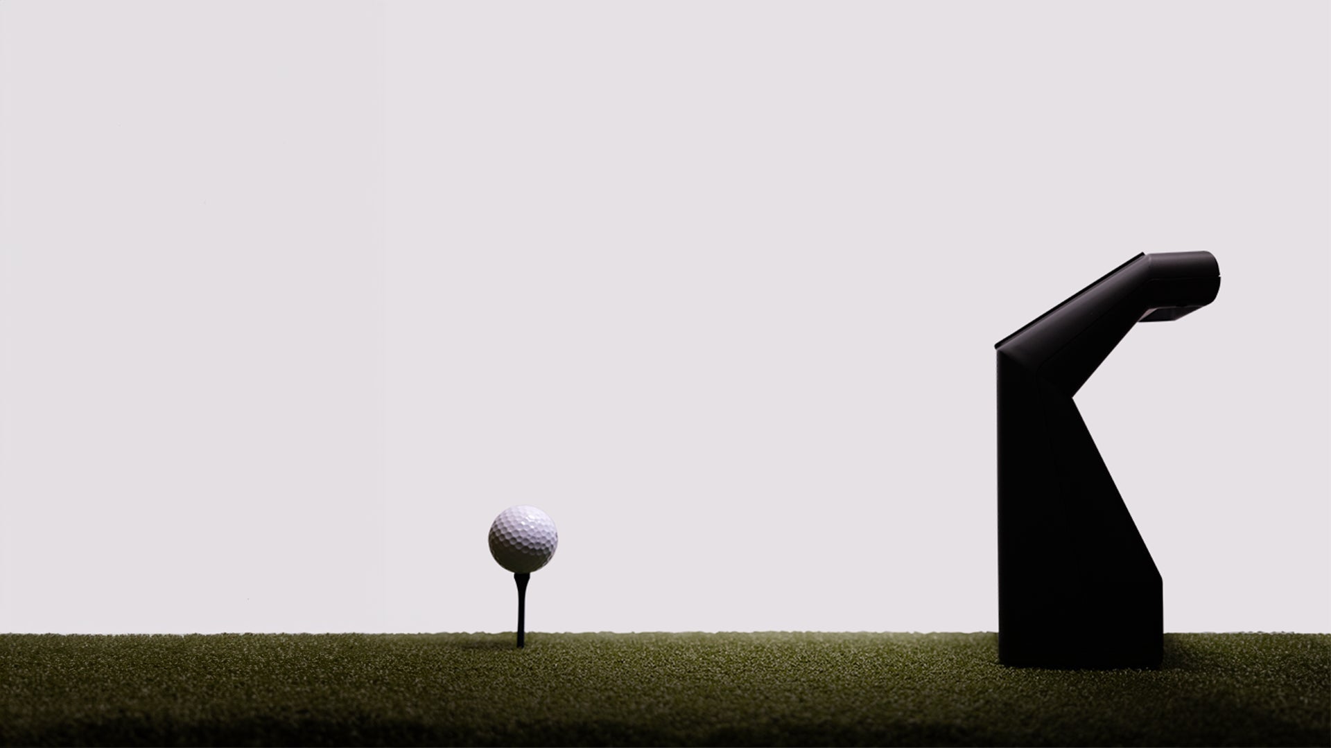 "Detail shot of the TruGolf LaunchBox Launch Monitor focusing on lens and precision tracking system - ALLBGT"