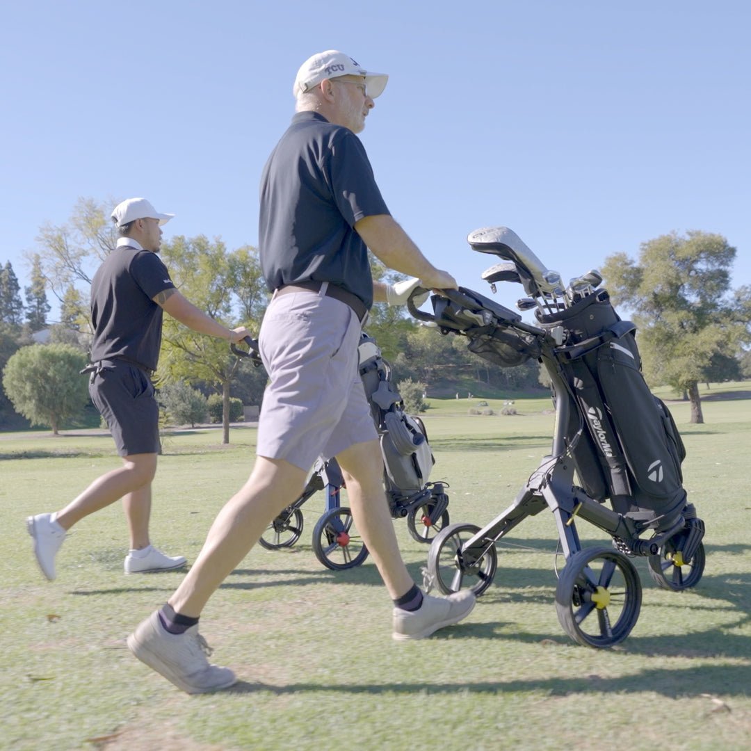 Golfers walking with Cybercart Push+ golf push cart on the course - ALLBGT