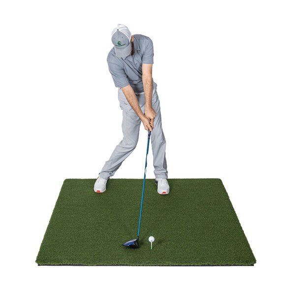 Person practicing golf swings on SIG Fairway series golf mat with a white background - ALLBGT