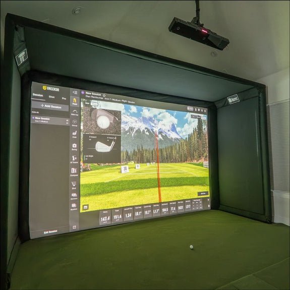SIGPRO Golf simulator enclosure setup with screen displaying a golf course and a projector above - ALLBGT