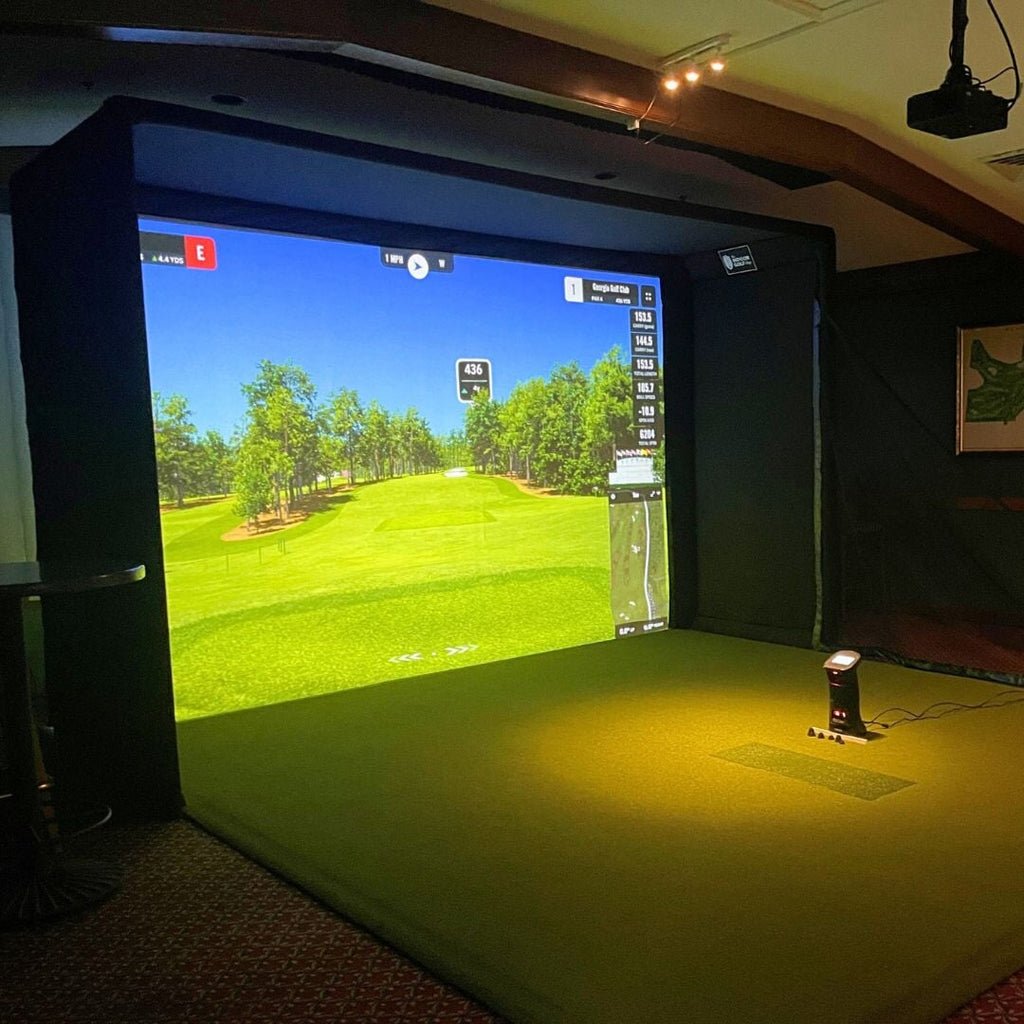 SIGPRO Commercial Indoor golf simulator setup with a screen displaying a golf course - ALLBGT