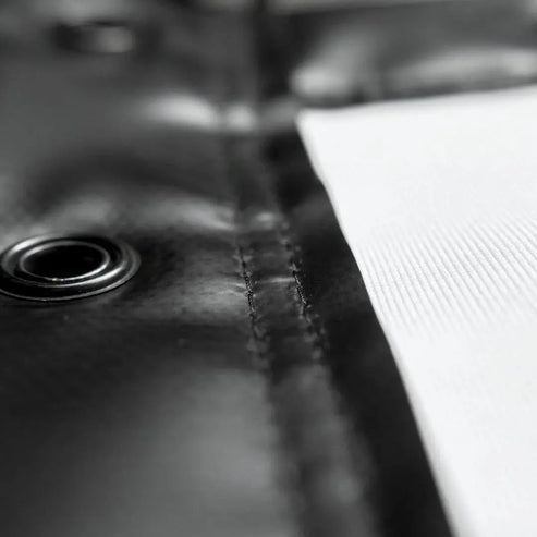 SIGPRO Premium impact screen Close-up of a leather surface with stitching detail