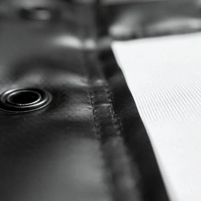 SIGPRO Premium impact screen Close-up of a leather surface with stitching detail