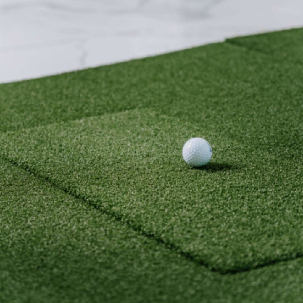 SIGPRO Softy Hitting Strip surface close-up showing true fairway feel for indoor golf simulator 