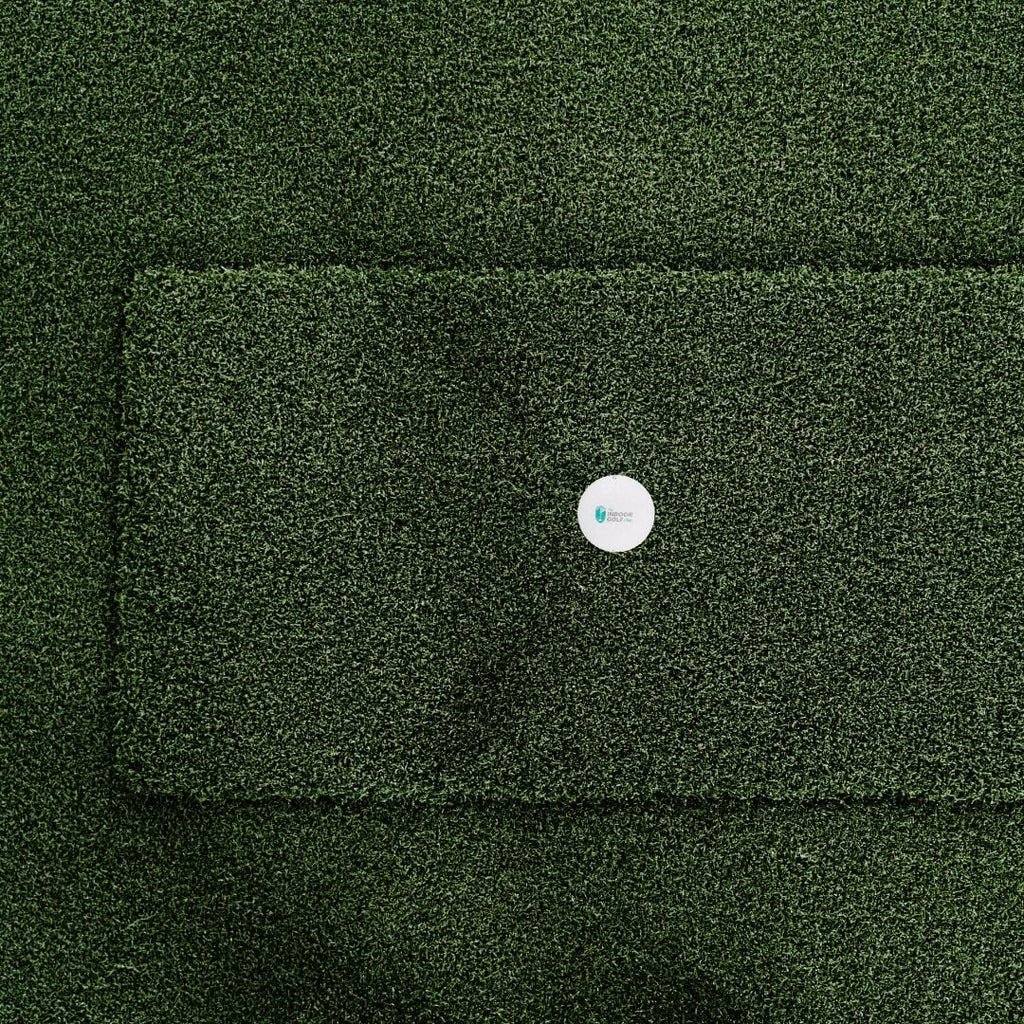 SIGPRO Softy Hitting Strip top view with golf ball showing realistic fairway turf texture for indoor golf simulator
