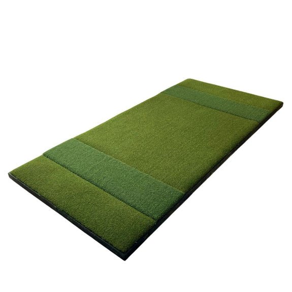 SIGPRO Super Softy 4' x 8'4" double sided golf mat angled view indoor turf surface.